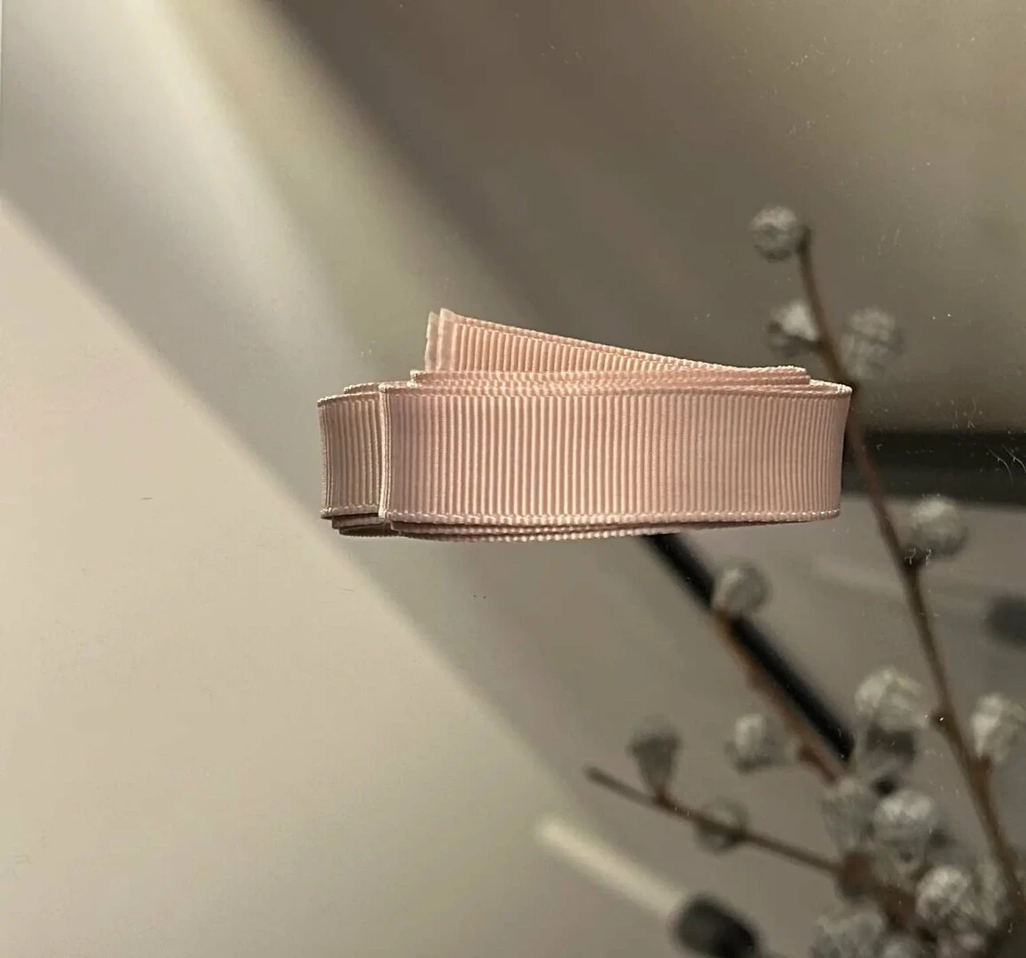 Båndrulle til strikkekit i farven beige rose